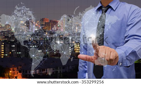 business man touch visual world map screen with cityscape background , business concept