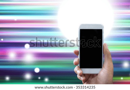 Man's hand shows white smartphone in vertical position on abstract, technology background - mockup template