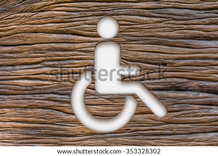 Wood sign for people with disabilities