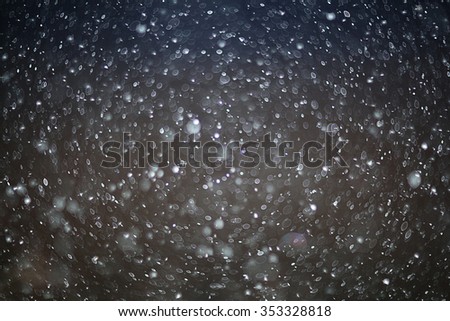 texture of white rain drops on a black background for a filter on the photo