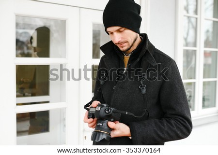Man exploring pictures on the camera