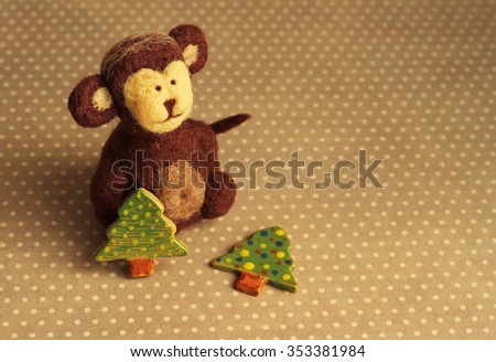 toy monkey and christmas tree
