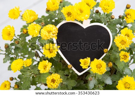 bouquet of flowers with a sign heart