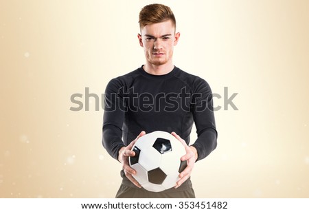 Man holding a soccer ball