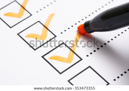 Check list and marker Royalty-Free Stock Photo #353473355