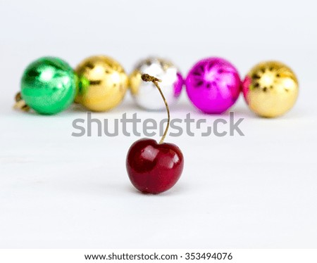 Fresh Cherry and Colorful collection Balls background.