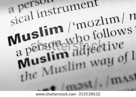 Close up of English dictionary page with word muslim