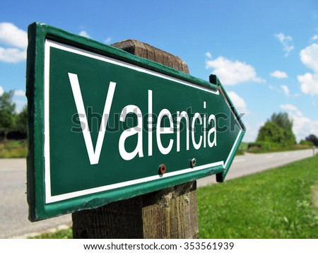 Valencia signpost along a rural road