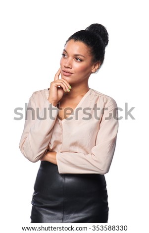 Confident successful mixed race caucasian - african american business woman thinking and looking away at blank copy space