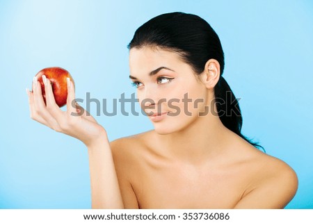 picture of pretty woman with red apple