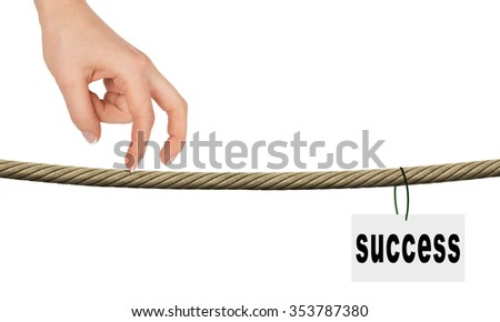 Womans fingers walking on rope with word success on isolated white background