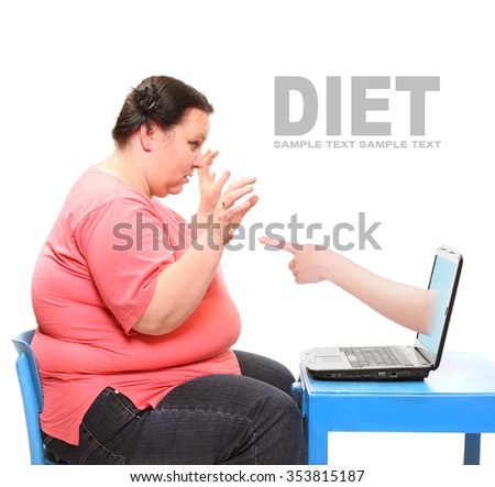 Overweight woman finding new diet online on her laptop. Picture with space for your text. 