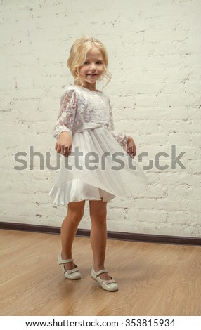 Pretty Little girl whirling

