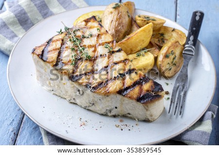 Barbecue Swordfish Steak on Plate Royalty-Free Stock Photo #353859545