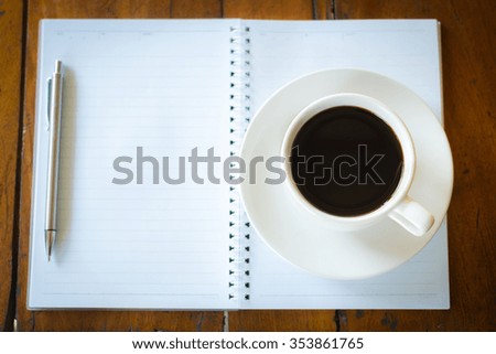  cup of coffee with blank note book and pen, Vintage style
