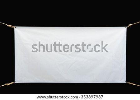 Copy space for text on disastrously white vinyl banner on black background .Clipping path Royalty-Free Stock Photo #353897987