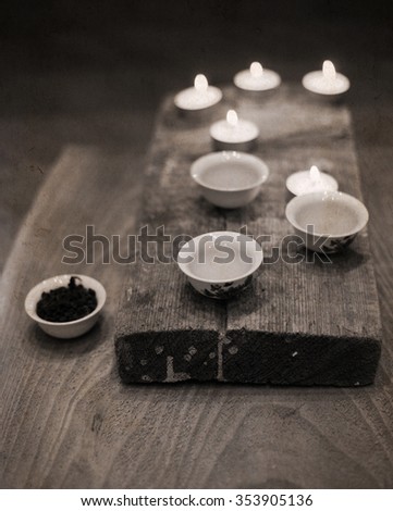 Artwork in vintage style, china tea,  candles