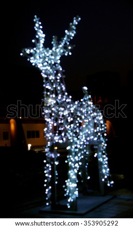 blurred of reindeer Bokeh for Christmas background