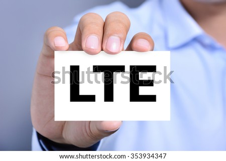 LTE (or Long Term Evolution) letter on the card shown by a man