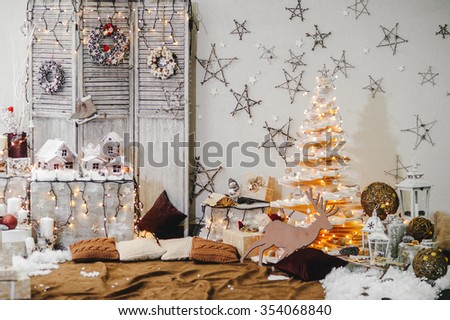 Beautiful holiday decorated room. Creative Christmas tree. new year. Christmas decorations.
