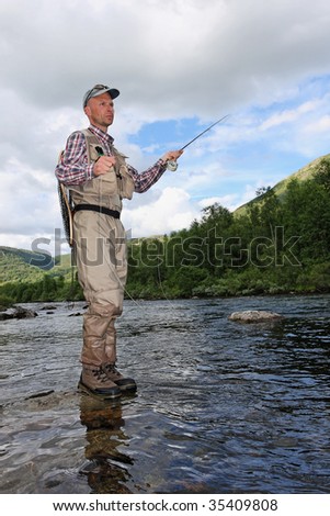 A man fly-fishing in Hemsila, Norway