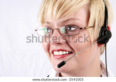 Customer Representative with headset during a telephone conversation