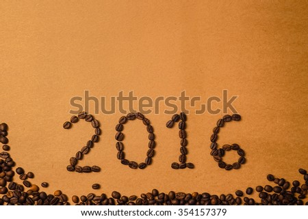 2016 coffee beans on paper texture in vintage style for new year concept