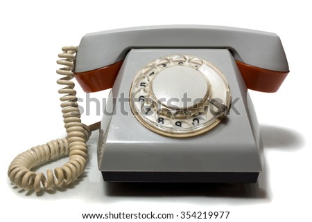retro rotary phone on a white isolated background