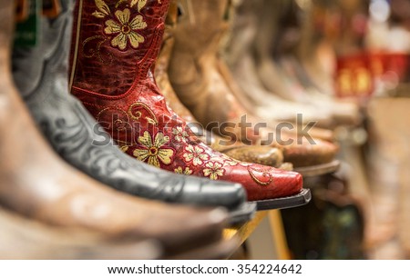 Cowboy boots in a store Royalty-Free Stock Photo #354224642