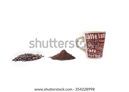 isolared coffee grains and tool and cup