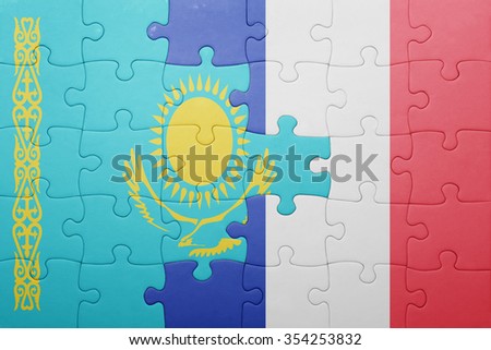 puzzle with the national flag of kazakhstan and france . concept