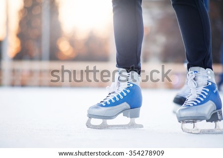 people skating on the ice city rink 