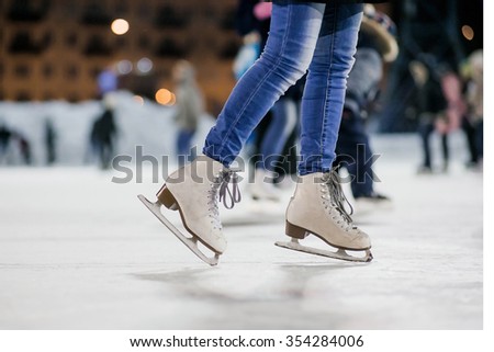 the girl on the figured skates on a opened skating rink Royalty-Free Stock Photo #354284006