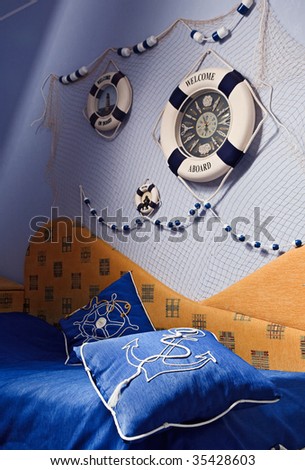 Sea decor in blue bedroom interior Royalty-Free Stock Photo #35428603