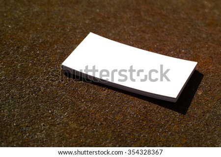 Two business card mockup over grass background. Can be used for the presentation of the brand, company or person. Business card are clipped. 90x50mm
