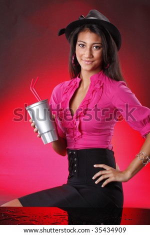 Red on red girl with silver soda cup