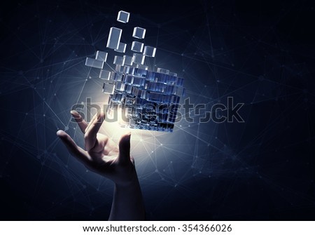 Businesswoman hand touch cube as symbol of problem solving 