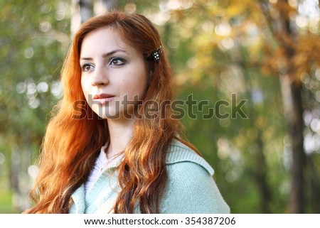 redhead girl Autumn leaves