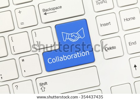 Close-up view on white conceptual keyboard - Collaboration (blue key)