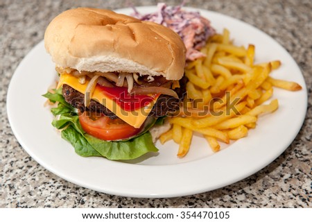 Home made beef burger in bun meal
