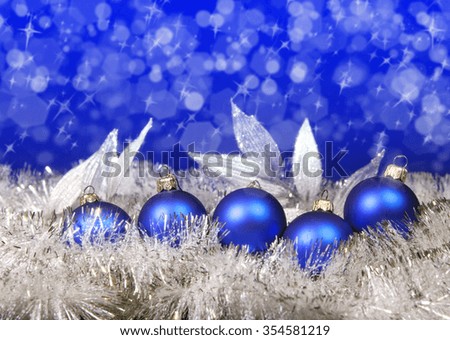 Blue New Year's balls  on a blue background