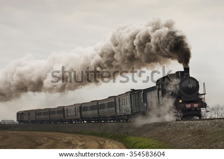 vintage black steam train Royalty-Free Stock Photo #354583604
