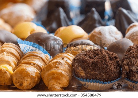 In the pictured colorful pastries with candied,cream and chocolate, the real Italian confectionery.