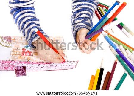 child painting on paper the house