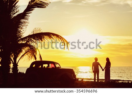 Perfect vacation picture of happy couple in honeymoon in sunset