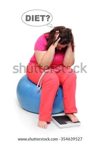 Overweight woman with measure tape and weighing machine. Picture on slimming theme.