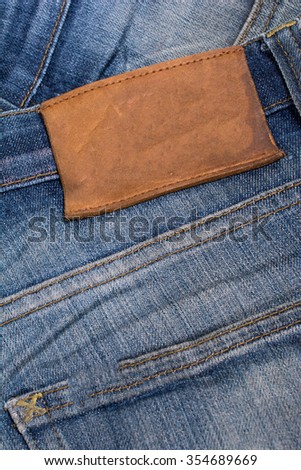 Back of blue jeans with leather label