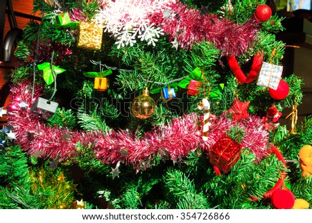 Christmas decoration, pine cones,gift,baubles,on christmas tree
