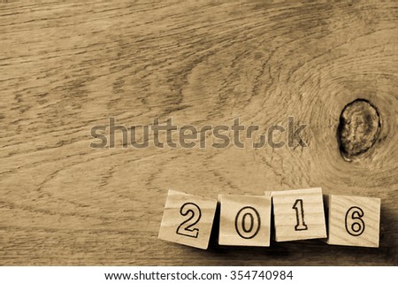 happy new year wooden block text for new year concept