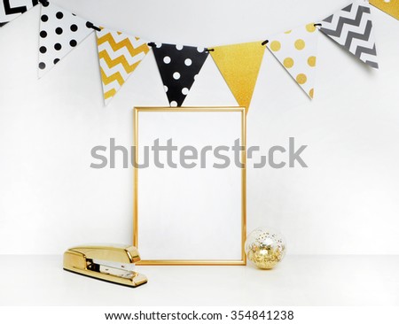 Mockup frame. Gold decoration. Gold frame and stapler. Festival flags, polka and chevron patterns